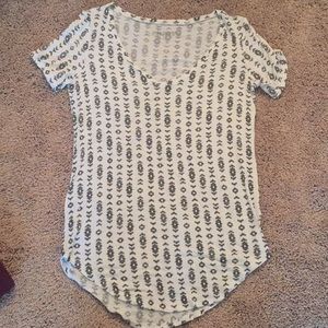 Aztec white and black top.